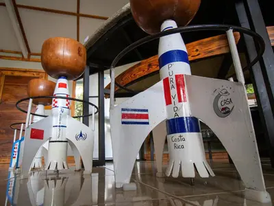 two white rockets are sitting on a table at Moon Wonders Vacation House in Monteverde Costa Rica