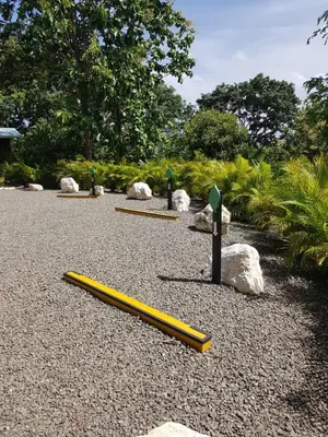 a row of yellow poles on the ground at Baliyana Lodge in San José Pinilla