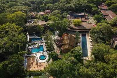 an aerial view of a mansion in a forest at El Mangroove Papagayo, Autograph Collection in Papagayo, Guanacaste