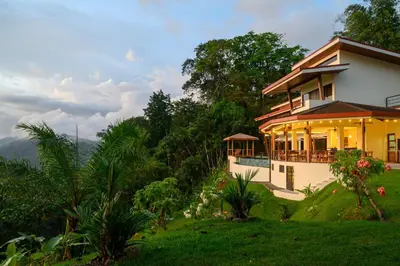 a house on top of a hill with a view at Lapazul Boutique Hotel in Savegre