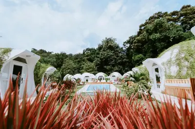 a view of the pool at the resort at Igloo Beach Lodge in Manuel Antonio