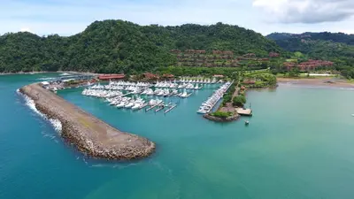 an aerial view of a marina with boats in the water at AltaVista 5A 3 bdr Ocean View in Los Suenos in Herradura
