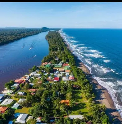 an aerial view of an island in the water at Cabinas ensueños in Tortuguero