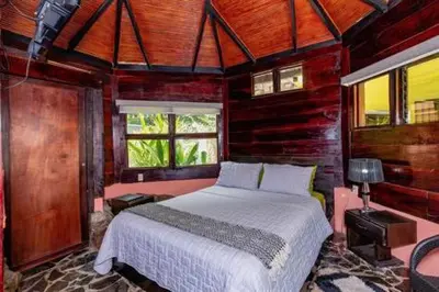 a bedroom with a large bed in a room at Casa Melosa in Potrero