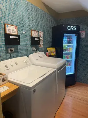 a refridgerator in a store with a gas refrigerator at ARANJUEZ LOFTS Santa Ana in Santa Ana