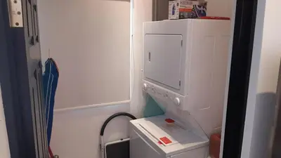 a kitchen with a white refrigerator and a washer and dryer at Malaga Herradura 25 with Private Pool in Herradura