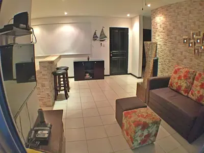 a living room with a couch and a table at Malaga Herradura 25 with Private Pool in Herradura