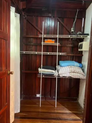 a room with a shelf with some towels on it at Casas Guaney, full furnished studios! in Manuel Antonio