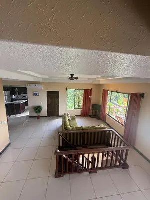 a living room with a couch and a table at Casa Susan in San Pedrillo