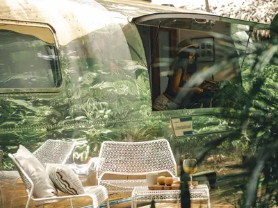 a couple of chairs and a table in a van at Airstream by the Sea in Nosara