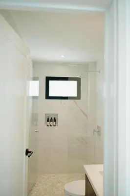 a bathroom with a shower with a toilet and a sink at Sky House Santa Teresa - Adults only in Santa Teresa Beach