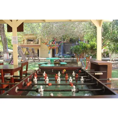 a view of a pool table in a park at Centro Vacacional Bancosta in Jacó