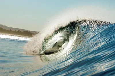 a large wave in the ocean on the water at Little Hawaii Avellanas in Playa Avellana