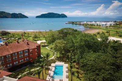 an aerial view of a resort and the beach at Marriott Vacation Club at Los Sueños in Jacó
