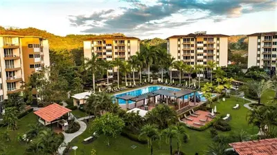 an aerial view of a resort with a swimming pool at Casa apartamento Costa Linda jaco in Jacó