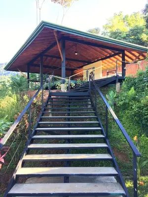 a set of stairs leading up to a building at Mango Tree Villas in Coronado