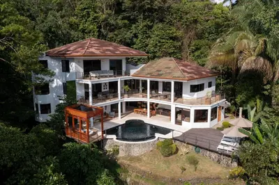 an aerial view of a house with a swimming pool at Casa Anjali by Sandglass in Manuel Antonio