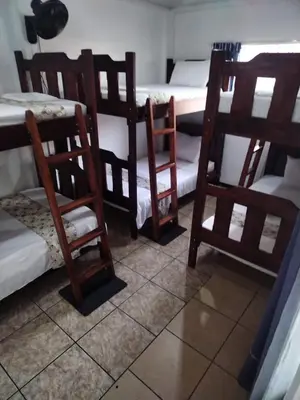 a group of bunk beds in a room at Lajuela BnB & Hostel in Alajuela City