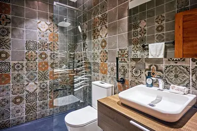 a bathroom with a sink and a toilet at NATURA Loft Garden in Santa Teresa Beach