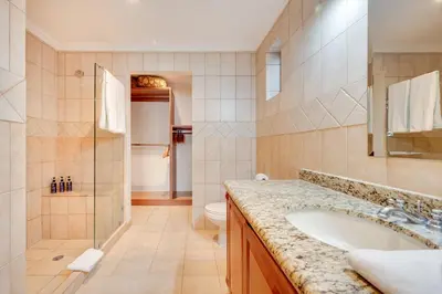 a bathroom with a sink and a toilet at Oceanica 804 in Playa Flamingo