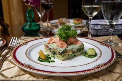a plate with a piece of food on a table at Grano de Oro Hotel in San José