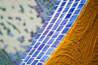a close up of a blue and white tiled floor at Hotel Vista de Olas in Santa Teresa Beach