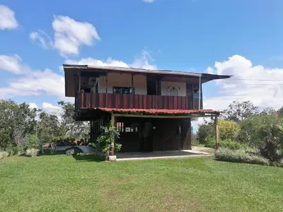 a house with a green lawn in front of it at Villas Josipek in Fortuna