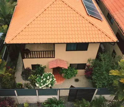 an overhead view of a house with an orange roof at Villas by Tekoa in Uvita