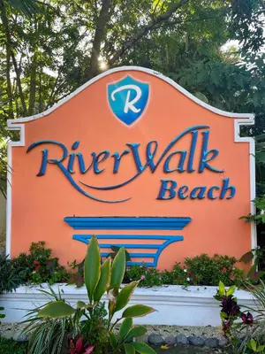 a sign for a rippall beach beach at Family oriented house just steps to the beach in Jacó