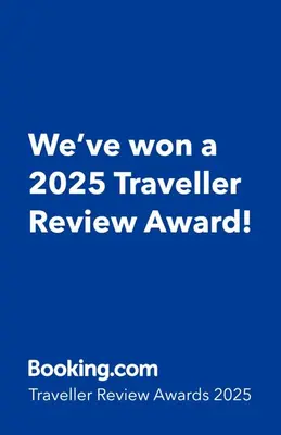 a blue sign that says weve won a traveler review award at Villasjungle 3 in Sámara