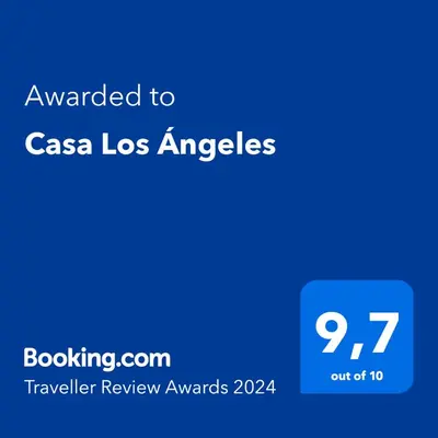 a blue screen with the text awarded to casa los angels at Casa Los Ángeles in Ángeles