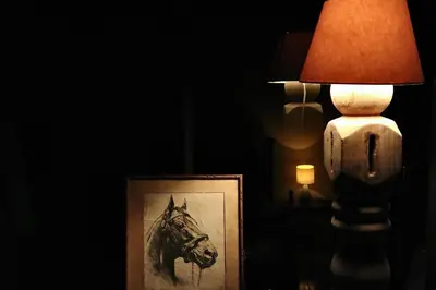 a picture of a horse in a room with a lamp at Casa Zu in San Pedro