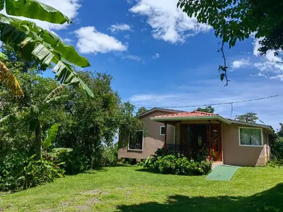 a small house with a yard at Monteverde House in Monteverde Costa Rica