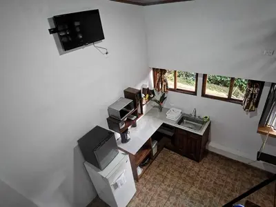 an overhead view of a room with a desk and a television at Cabaña Hamacas in Cartago
