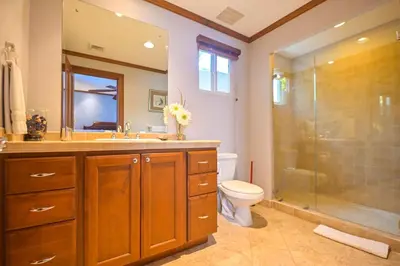 a bathroom with a shower and a toilet and a sink at Veranda 1H 3 bdr Garden View in Los Suenos in Herradura