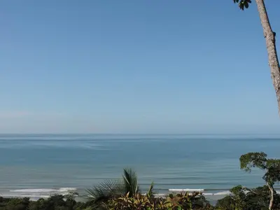 a view of the ocean from a resort at Ranchos Remo Lodge in Uvita