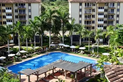an aerial view of the pool at the resort at Costa Linda 1-19, walking distance from the beach in Jacó