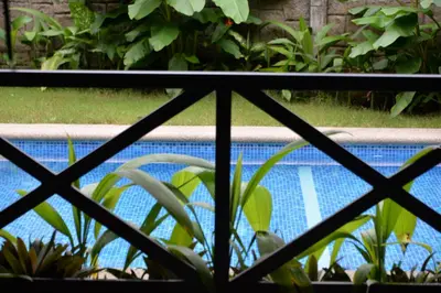 a view of a swimming pool from a window at Casa Kamagu in Fortuna