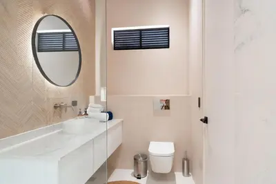 a white bathroom with a sink and a mirror at Nala Luxury Living - Santa Teresa - Costa Rica in Santa Teresa Beach