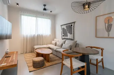 a living room with a couch and a table at Nala Luxury Living - Santa Teresa - Costa Rica in Santa Teresa Beach