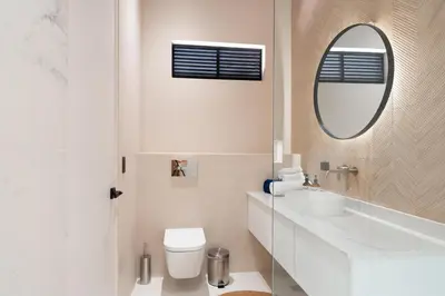 a white bathroom with a sink and a mirror at Nala Luxury Living - Santa Teresa - Costa Rica in Santa Teresa Beach