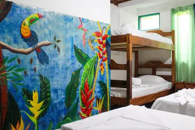 a room with a colorful mural on the wall at Hotel La Cascada in Puntarenas