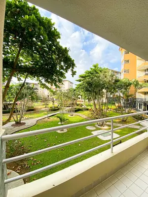 a balcony with a view of a park at Costa Linda 6-08 in Jacó