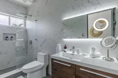 a bathroom with a sink and a toilet and a shower at Peace Villa Santa Teresa - Walking distance to the beach in Santa Teresa Beach