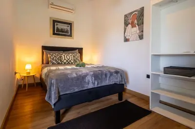 a bedroom with a bed in a room at BUDDA HOME in Tortuguero