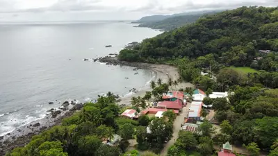 an aerial view of a beach with houses and trees at Montezuma Hills - Twin Houses in private compound - 4' to Downtown in Montezuma