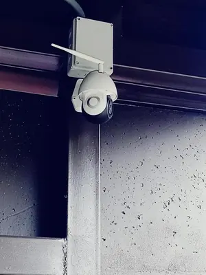 a security camera on the side of a building at Villas del General in San Isidro