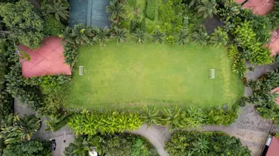an overhead view of a park with a green field at Hotel Boutique Casa Del Rio in Fortuna