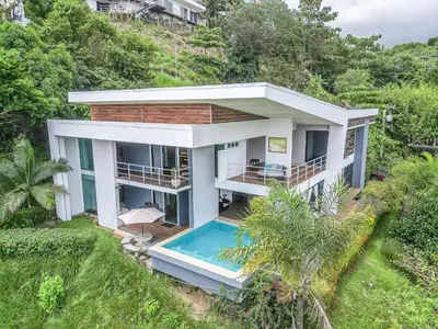 an aerial view of a house with a swimming pool at Luxury Villa #9 De Los Pájaros in Playa Hermosa