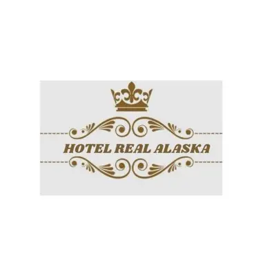 a tiara and a crown on top of a hotelreal alaska logo at Hotel Real Alaska in Liberia